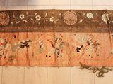 an image of an old oriental rug on the floor