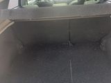a trunk of a car with the trunk open