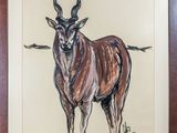 painting of an antelope in a wooden frame on a wall