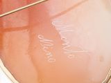 a close up of a mirror with writing on it