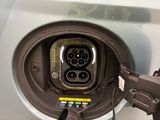 a close up of a car ' s plugged in to a vehicle