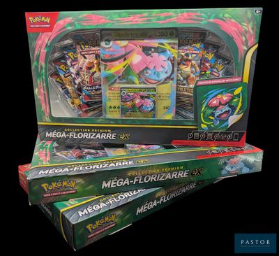 trois boîtes de cartes Pokémon sont empilées les unes sur les autres
