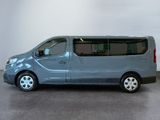 an image of a blue van parked in a room