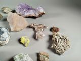 a lot of different colored rocks on a table