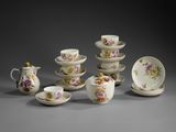 an image of a group of cups and saucers with flowers on them