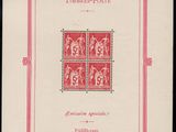 a red and white book with a picture of a man on it