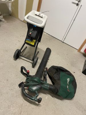 a bag and a vacuum on the floor in a room