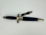 a knife that is laying on top of a table