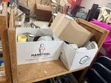 a box of items sitting on a table in a room