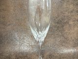 a wine glass that is sitting on a table