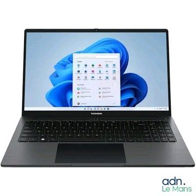 the laptop is open and ready to be used on the desk