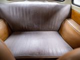 an image of a seat in the back of a bus