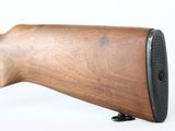 a close up of a rifle on a white background
