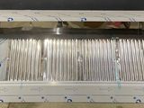 a picture of a stack of silver plates in a box