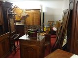a room with a lot of furniture in it