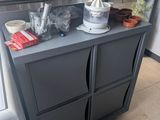 a coffee maker on a counter in a kitchen