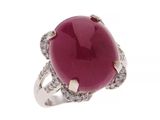 une bague ovale sertie d'un rubis et de diamants, signée Van Cleef