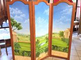peinture représentant un paravent avec une vue sur un parcours de golf