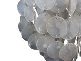 a close up picture of a chandelier made out of shells