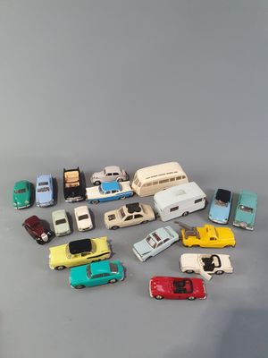 a lot of toy cars that are sitting on a table
