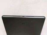 a close up of the back of an apple ipad with a silver cover