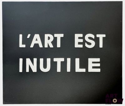 black and white photograph of a sign that says l ' art est nutile