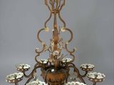 chandelier made of iron and glass with flowers and leaves