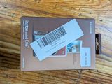a box with a barcode on it sitting on a wooden table