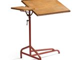 an image of a wooden drafting table on a white background