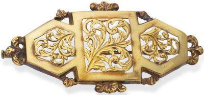 an image of a gold broochle on a white background