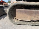 an image of a close up of a bulldozer tire