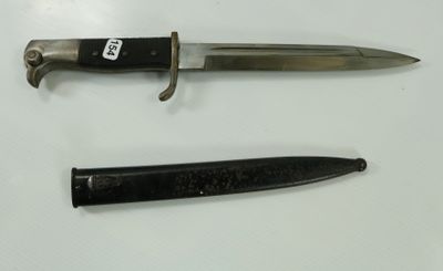 a knife and a knife holder on a table
