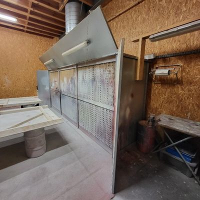 an image of a kitchen area with a stove and cabinets