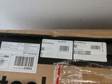 a cardboard box with a pair of labels on it