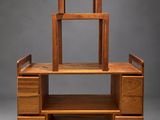 an image of a wooden desk with a mirror on top of it