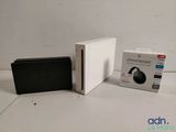 an image of a nintendo wii game console next to a box