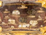 a picture of a gold frame with a picture of a nativity scene in it