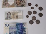 a lot of money on the table with a lot of coins