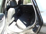 a car that has two seats in the back of it