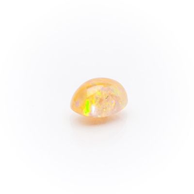 a yellow oplite stone on a white background