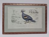 painting of a blue bird in a frame hanging on a wall