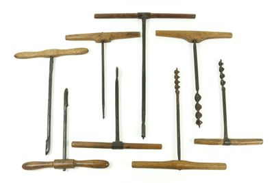 several different types of tools are arranged on a white surface