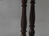 a small wooden table with a clock on top of it