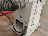 a machine that is sitting on a table in a room