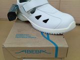 a box with a pair of white shoes on it