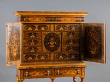 a wooden cabinet with a door open on a stand