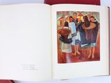 an open book with a picture of a group of people
