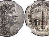 a silver coin with an image of a woman on it