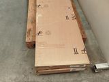 a box that is sitting on the floor next to a wall