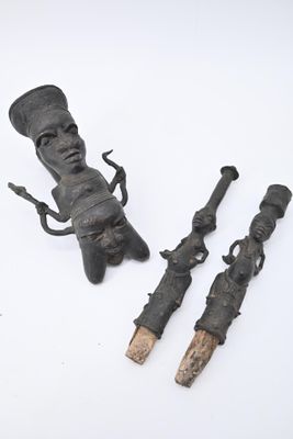 Pipe présentant sur le fourneau un personnage masculin aux f…